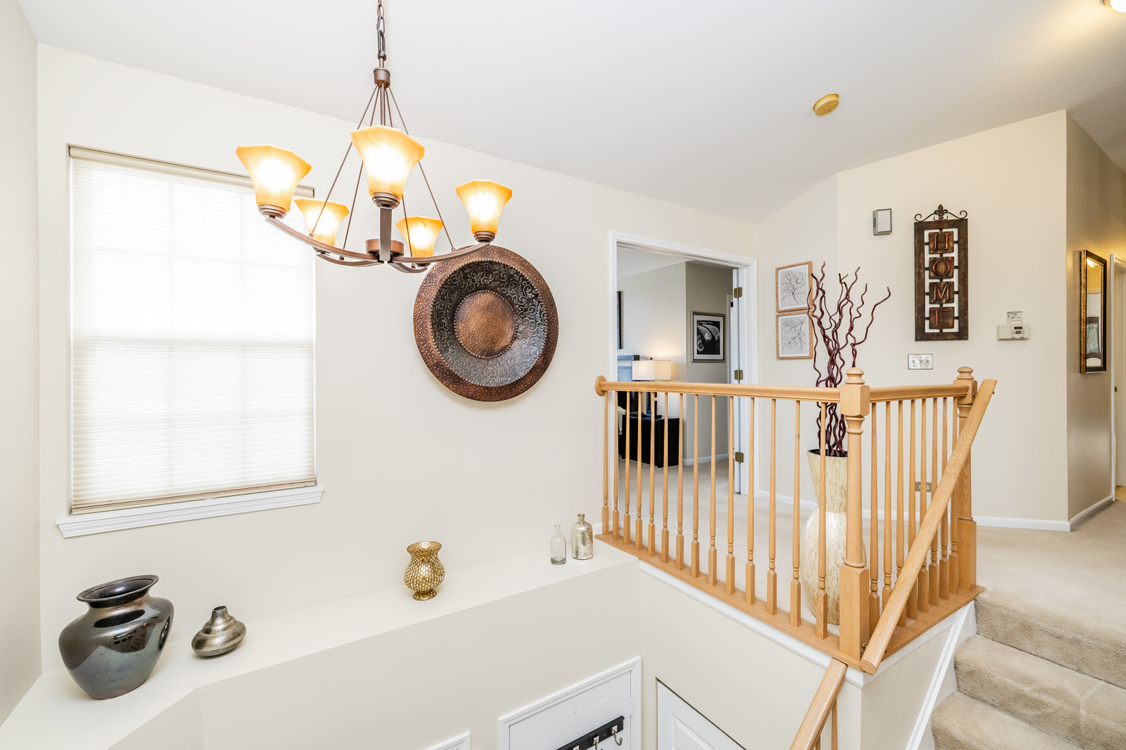 274 Wildspring Court Itasca, IL 60143 - Photo 5 of 42 a view of a livingroom with wooden furniture