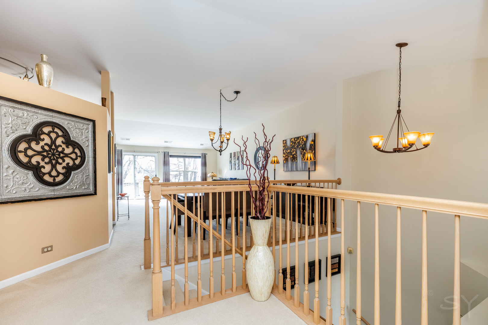 274 Wildspring Court Itasca, IL 60143 - Photo 6 of 42 a view of a hallway with windows
