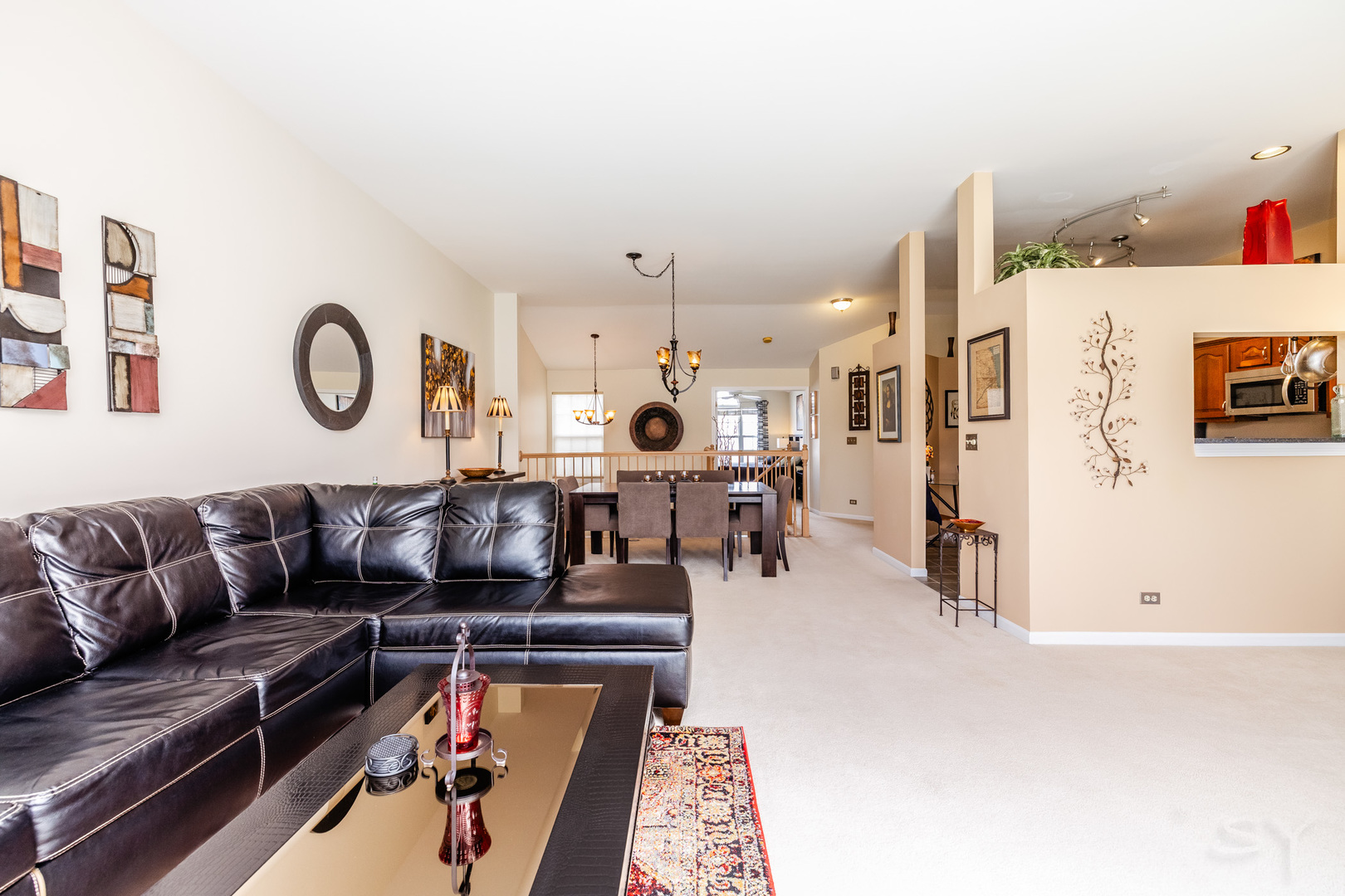 274 Wildspring Court Itasca, IL 60143 - Photo 9 of 42 a living room with furniture and kitchen view