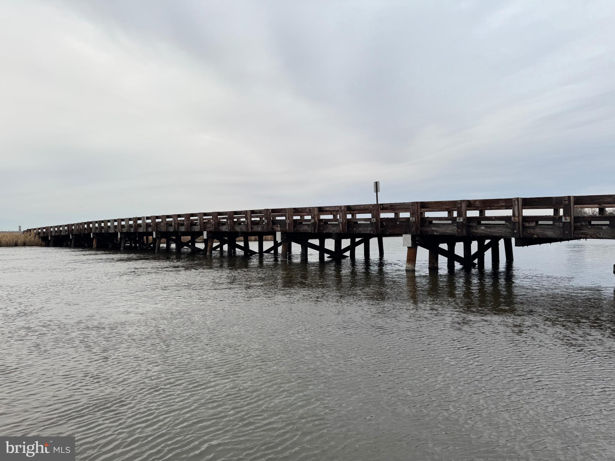 2728 Sandy Island Road Crapo, MD 21626 - Photo 11 of 15 a view of a chair and table in the roof