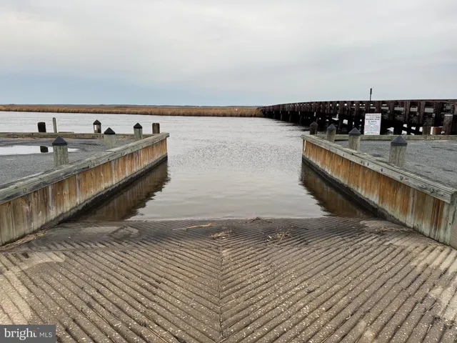 a view of swimming pool with seating space