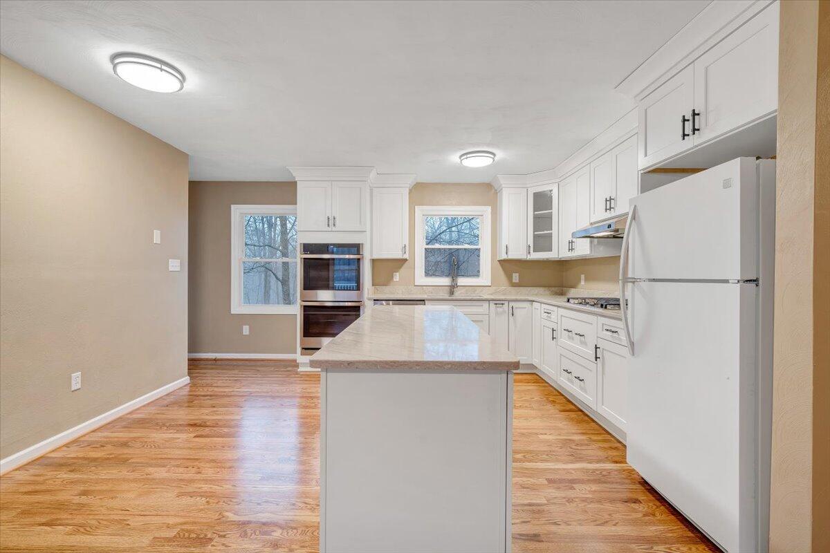 5146 Keffer Road Catawba, VA 24070 - Photo 12 of 43 a kitchen with stainless steel appliances a refrigerator and a stove top oven