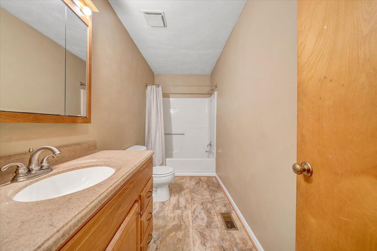 5146 Keffer Road Catawba, VA 24070 - Photo 17 of 43 a bathroom with a sink and a mirror