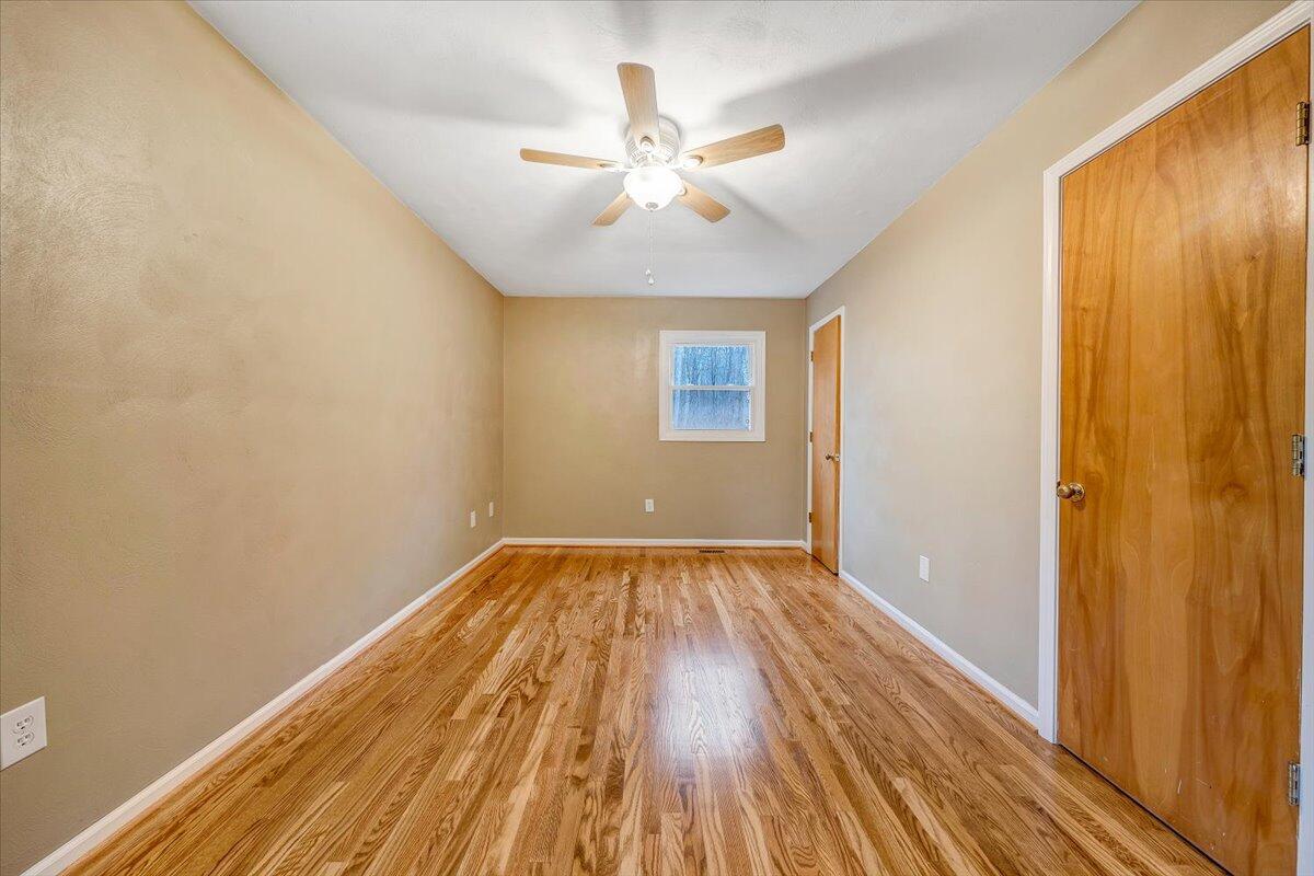 5146 Keffer Road Catawba, VA 24070 - Photo 19 of 43 wooden floor in an empty room with a window
