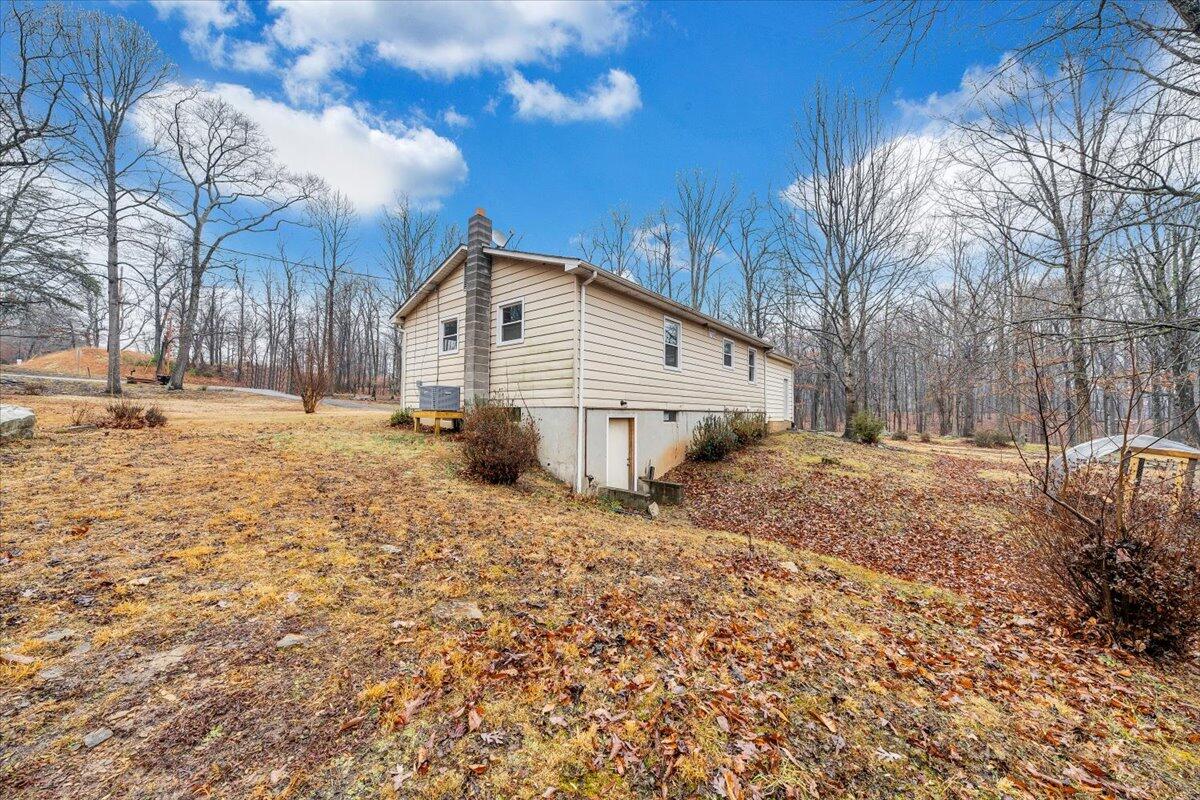 5146 Keffer Road Catawba, VA 24070 - Photo 38 of 43 a view of a house with a yard covered in snow