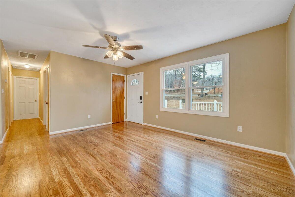 5146 Keffer Road Catawba, VA 24070 - Photo 6 of 43 wooden floor in an empty room with a window