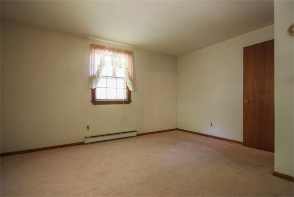 26 Gilson Road Littleton, MA 01460 - Photo 12 of 18 an empty room with a window