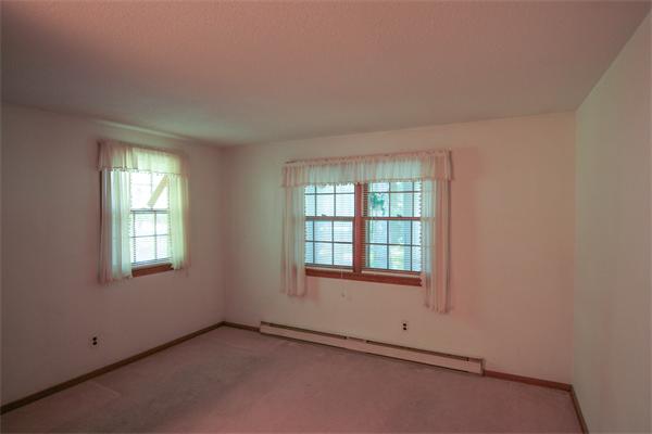 26 Gilson Road Littleton, MA 01460 - Photo 13 of 18 an empty room with windows