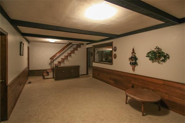 26 Gilson Road Littleton, MA 01460 - Photo 14 of 18 a view of an empty room with wooden floor