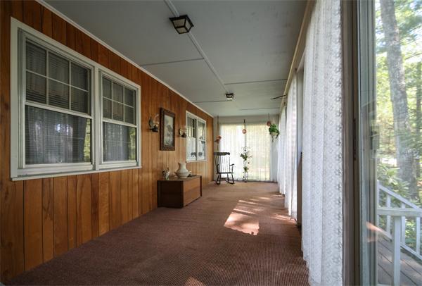 26 Gilson Road Littleton, MA 01460 - Photo 4 of 18 a view of a porch with seating space