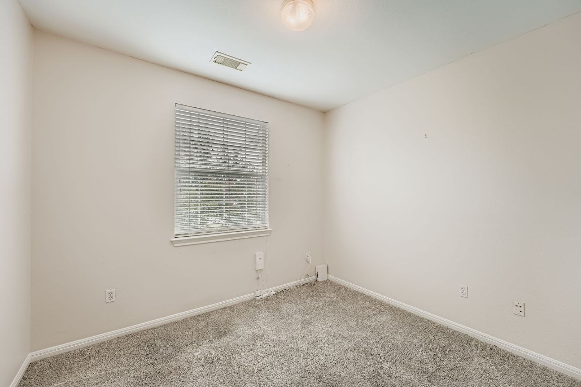 1101 East Parmer Lane, Unit 305 Austin, TX 78753 - Photo 19 of 37 an empty room with a window