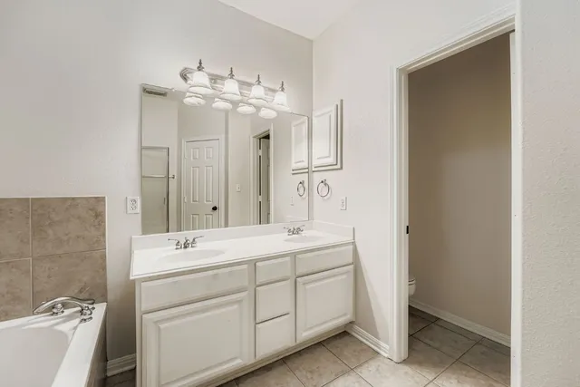 a swimming pool with outdoor seating and yard