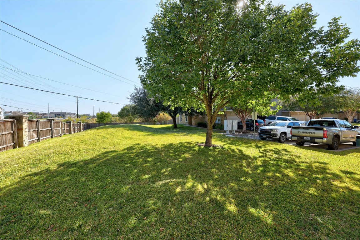1101 East Parmer Lane, Unit 305 Austin, TX 78753 - Photo 33 of 37 a view of a swimming pool with a patio