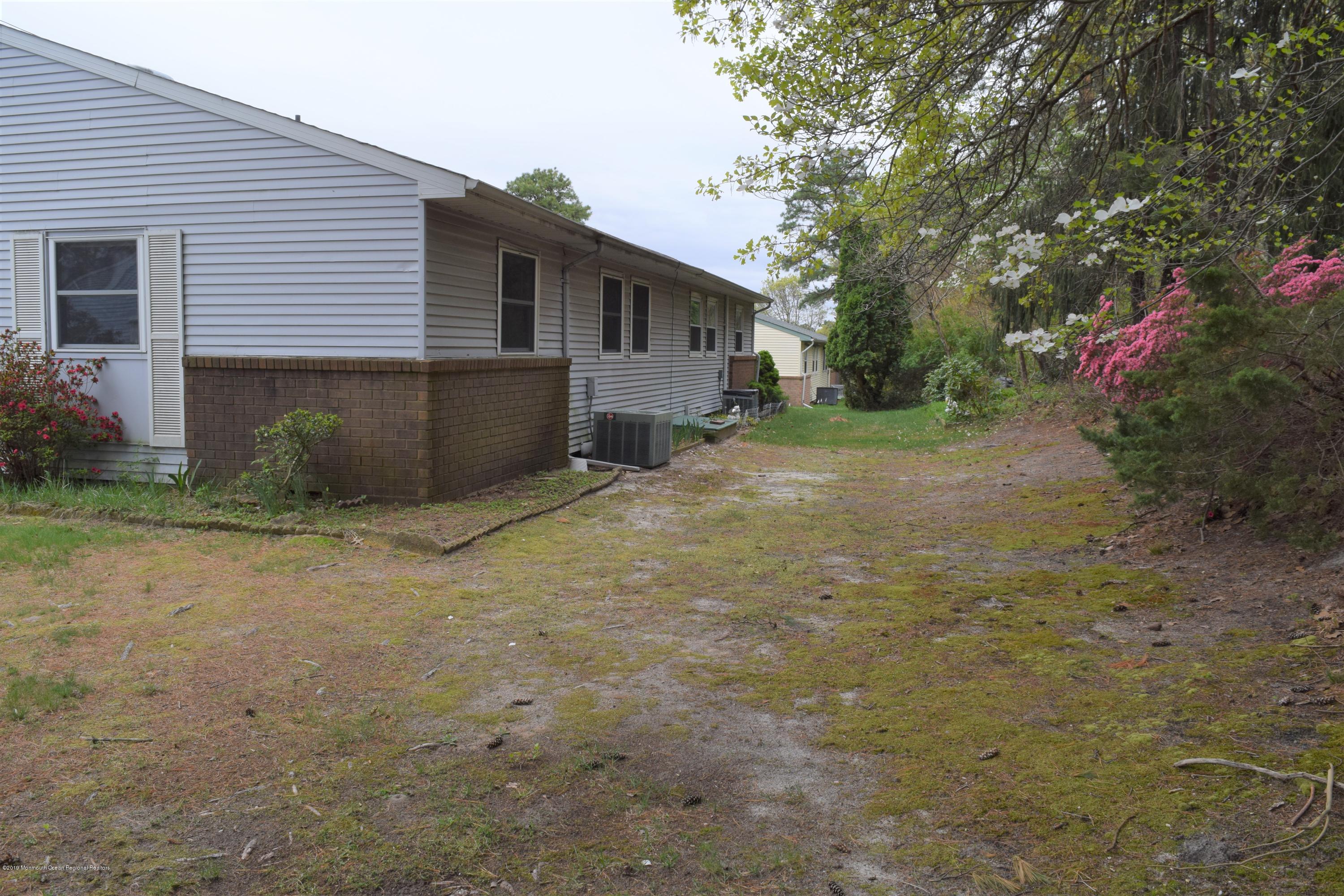 9 B Sunset Road Whiting, NJ 08759 - Photo 7 of 54 a view of a house with a yard
