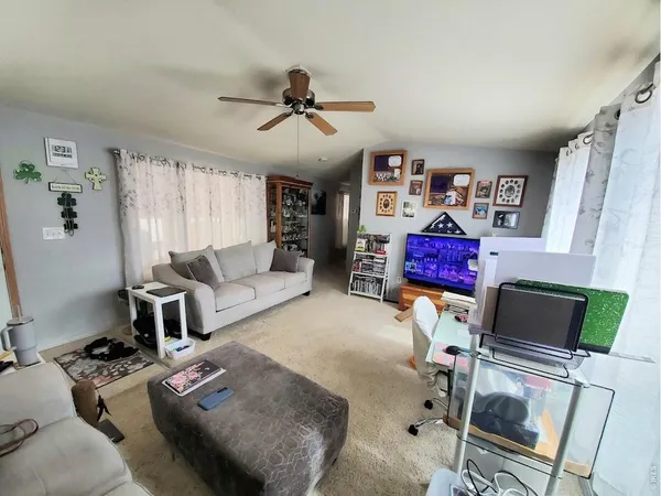 a bed room with a bed furniture and a window