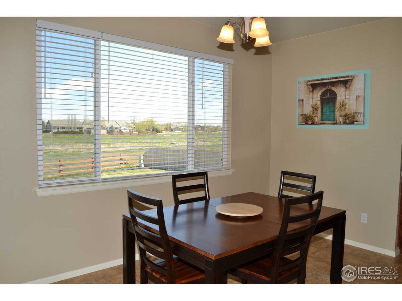 8400 Raspberry Drive Frederick, CO 80504 - Photo 7 of 25 a view of a workspace with a window