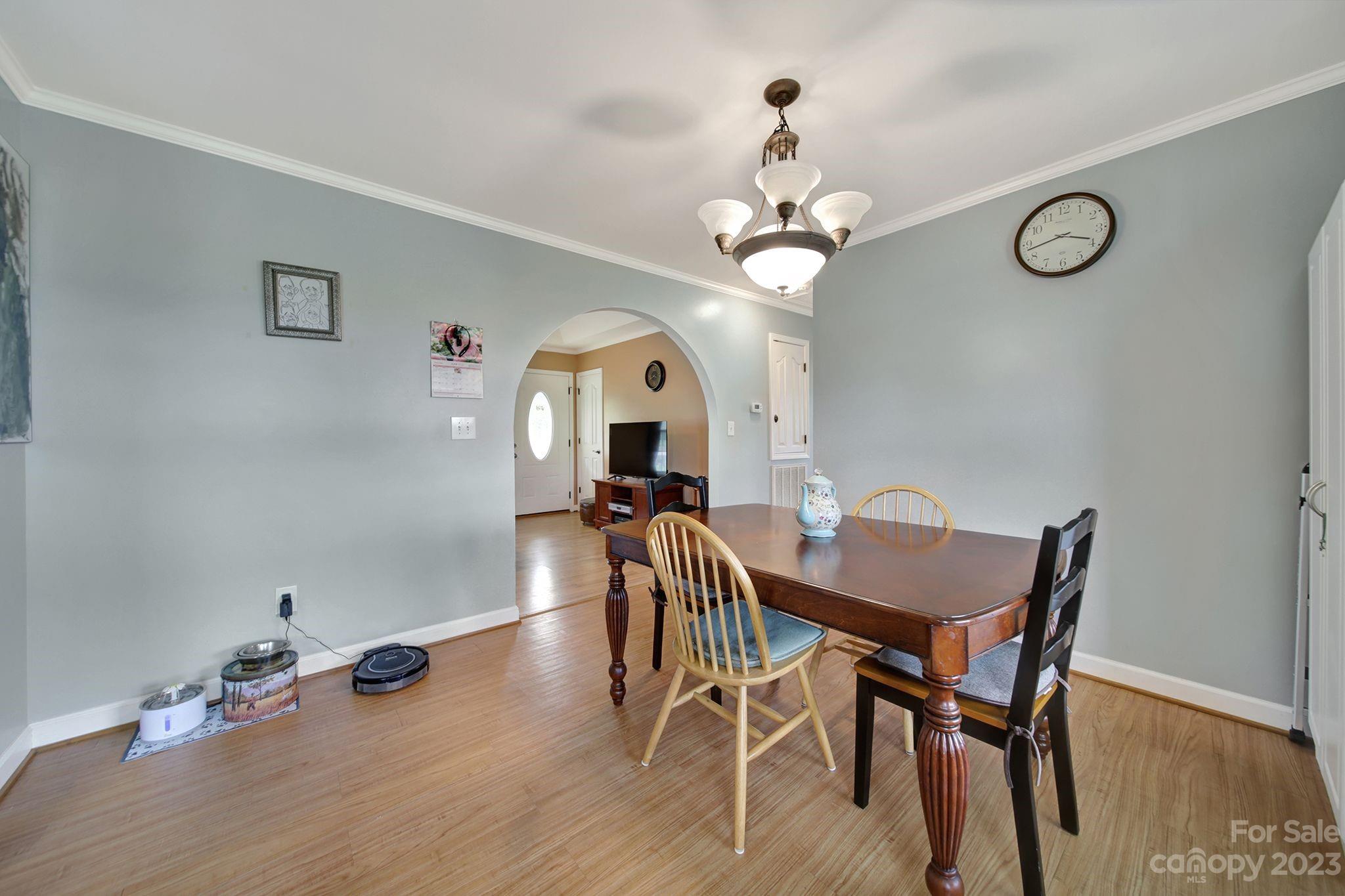 2674 State Rd S-29-330 Lancaster, SC 29720 - Photo 5 of 25 a view of a dining room with furniture and wooden floor
