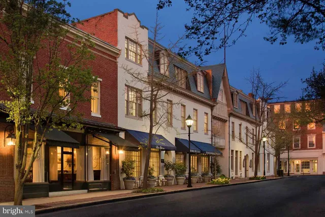 a city street lined with tall buildings