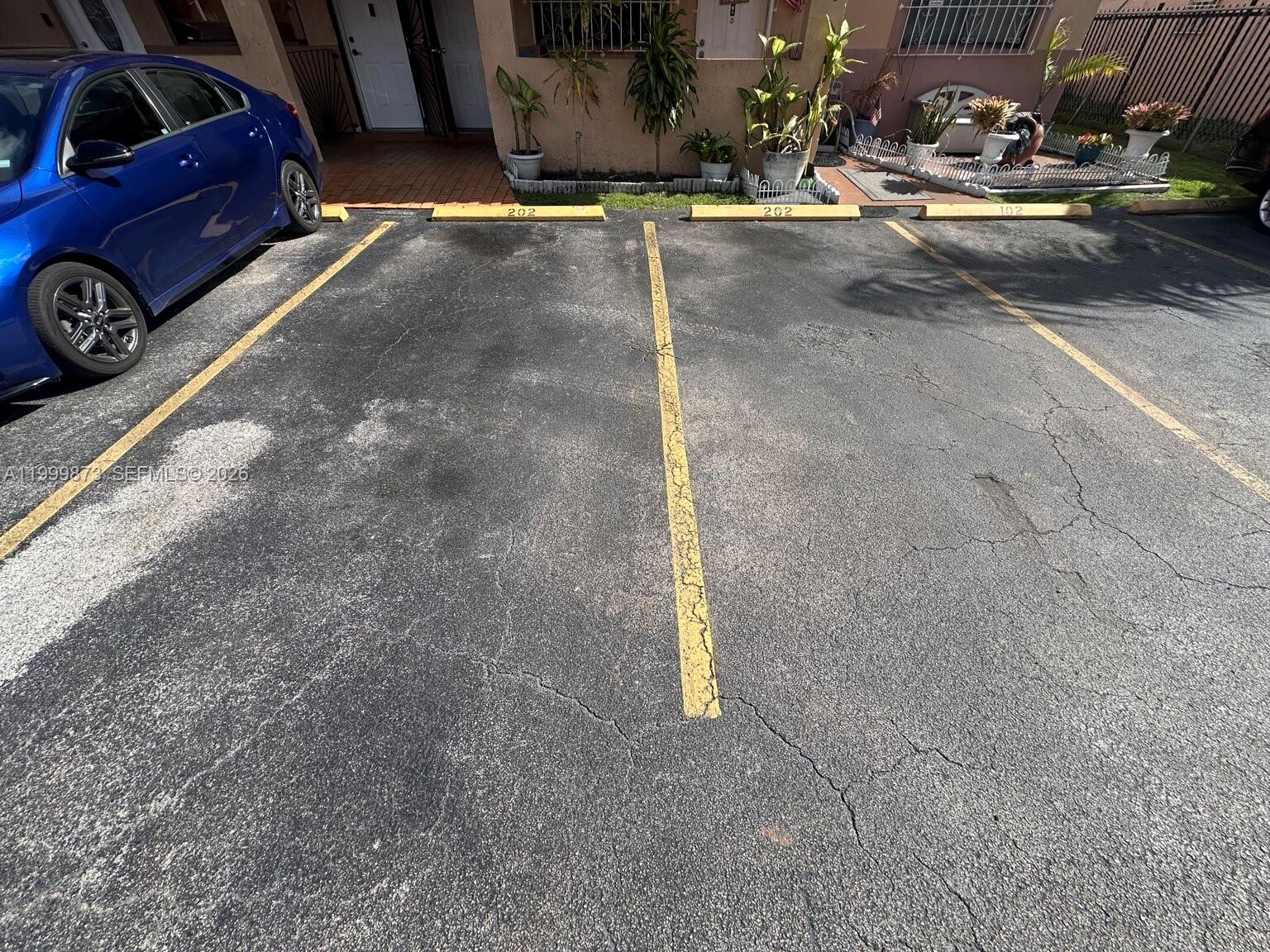 7952 West 29th Way, Unit 202 Hialeah, FL 33018 - Photo 12 of 12 a view of a backyard of a house