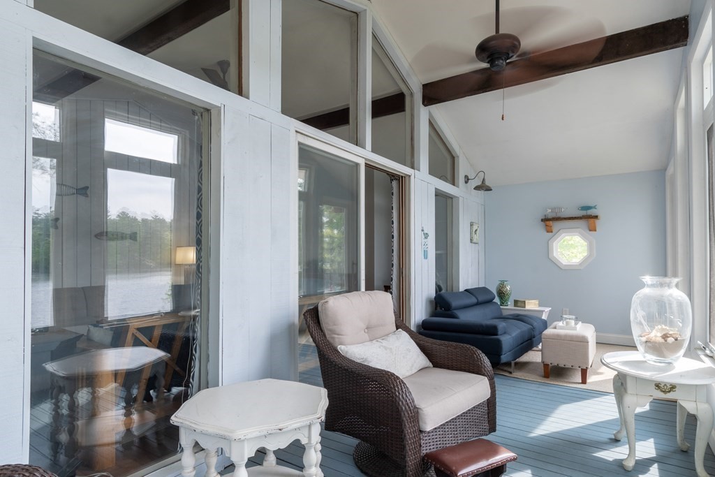 7 Sunset Drive Merrimack, NH 03054 - Photo 14 of 35 a living room with furniture and a potted plant