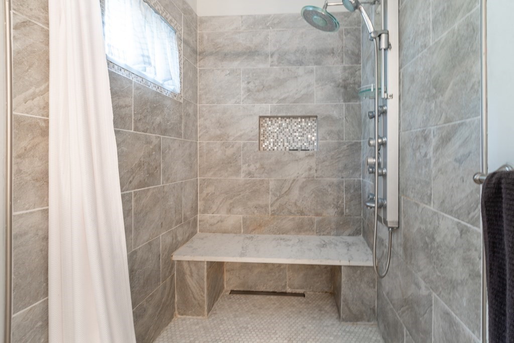 7 Sunset Drive Merrimack, NH 03054 - Photo 16 of 35 a bathroom with a shower