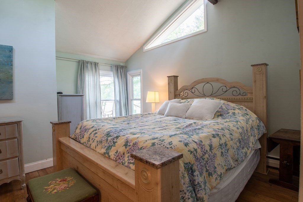 7 Sunset Drive Merrimack, NH 03054 - Photo 17 of 35 a bedroom with a bed and window