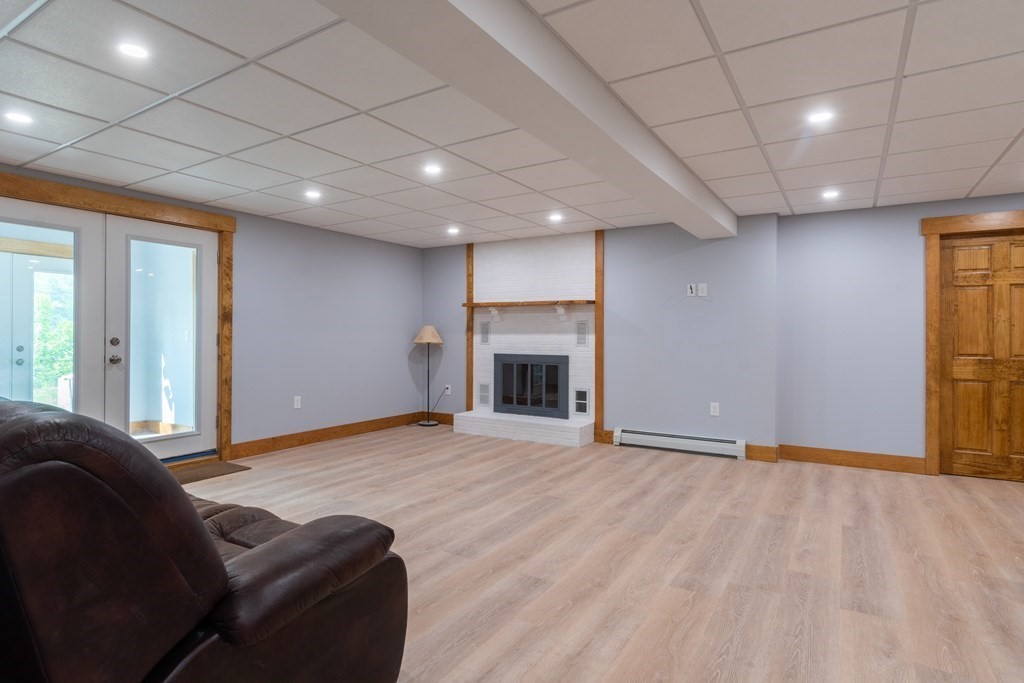 7 Sunset Drive Merrimack, NH 03054 - Photo 23 of 35 a view of livingroom with furniture wooden floor and window