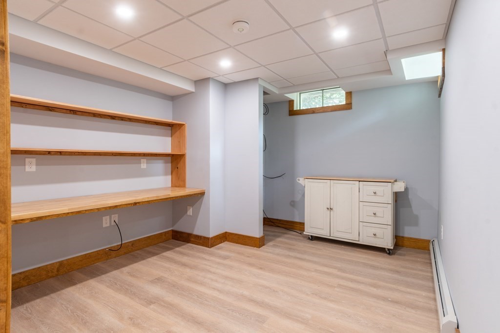 7 Sunset Drive Merrimack, NH 03054 - Photo 24 of 35 a view of an empty room with a window