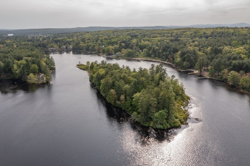 7 Sunset Drive Merrimack, NH 03054 - Photo 34 of 35 an aerial view of lake and trees