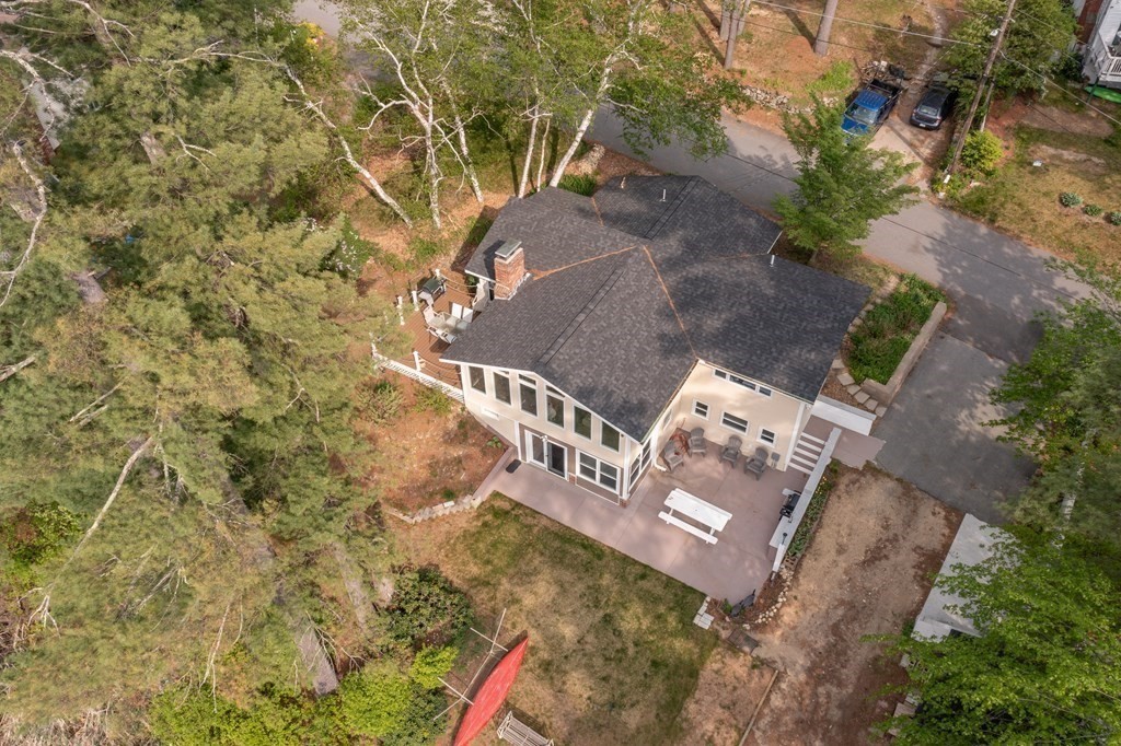 7 Sunset Drive Merrimack, NH 03054 - Photo 35 of 35 an aerial view of a house with a yard and trees