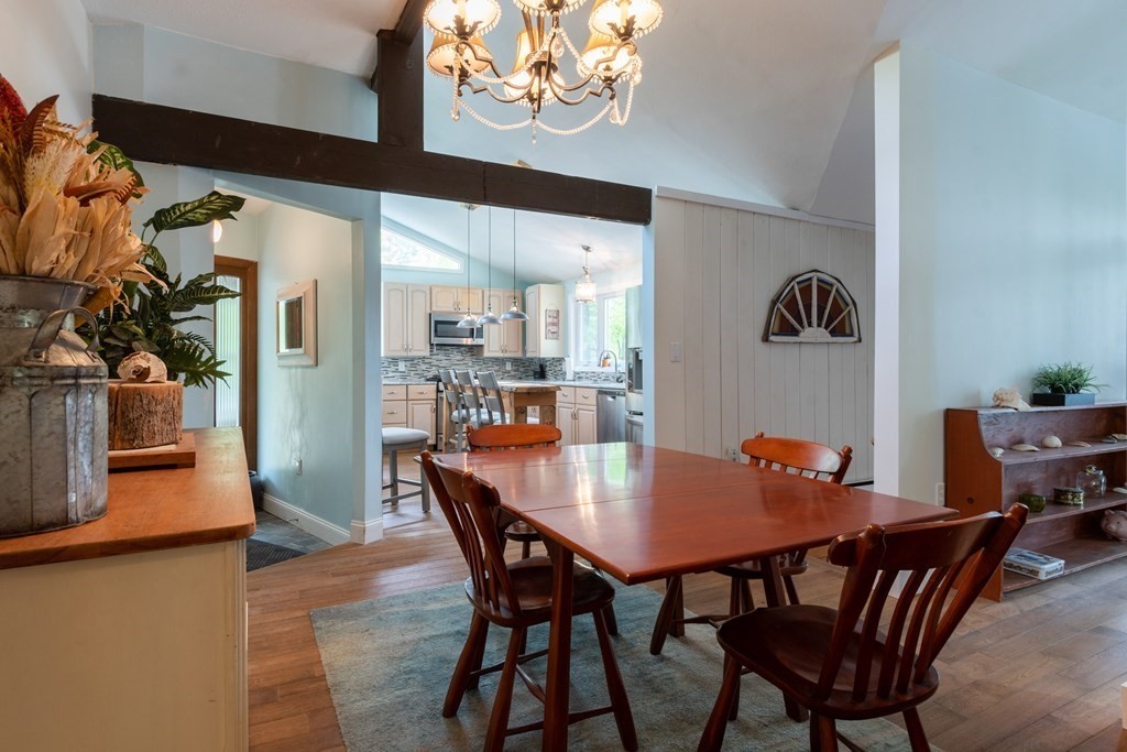 7 Sunset Drive Merrimack, NH 03054 - Photo 8 of 35 a dining room with furniture and wooden floor