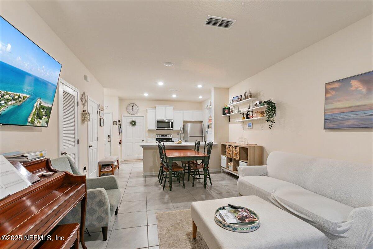 86472 Shortline Circle Yulee, FL 32097 - Photo 9 of 24 09-Living Room & Dining Room