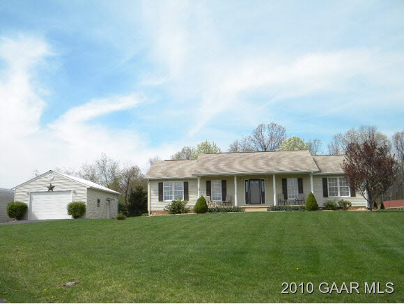 66 Spottswood Road Raphine, VA 24472 - Photo 1 of 12 a front view of a house with a yard