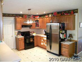 66 Spottswood Road Raphine, VA 24472 - Photo 3 of 12 a kitchen with stainless steel appliances granite countertop a refrigerator a stove and a sink