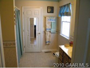 66 Spottswood Road Raphine, VA 24472 - Photo 5 of 12 a bathroom with a sink a toilet and shower