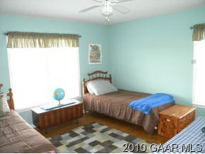 66 Spottswood Road Raphine, VA 24472 - Photo 7 of 12 a bedroom with a bed and window
