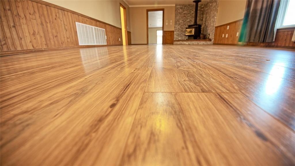 584 West Alamo Road Bowie, TX 76230 - Photo 38 of 40 a view of a room with wooden floor