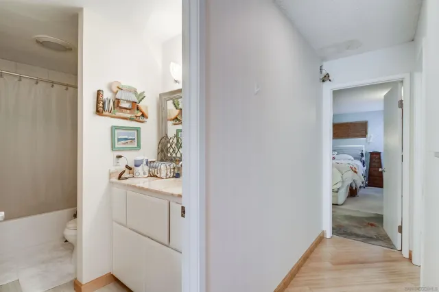 a hall way with storage and utility