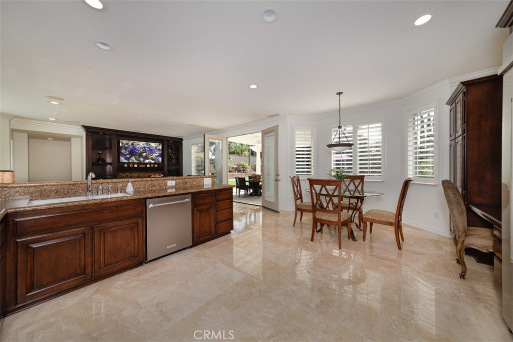 17722 Neff Ranch Road Yorba Linda, CA 92886 - Photo 10 of 63 a large kitchen with a table and chairs