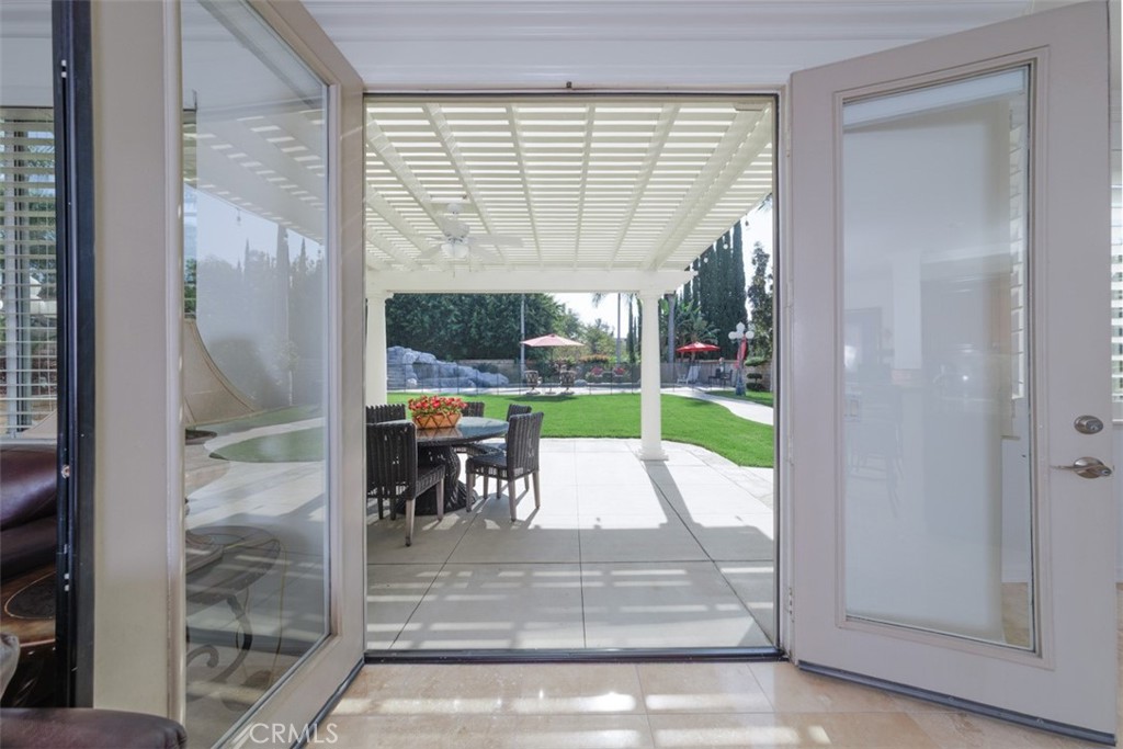 17722 Neff Ranch Road Yorba Linda, CA 92886 - Photo 14 of 63 a view of a patio with a table and chairs