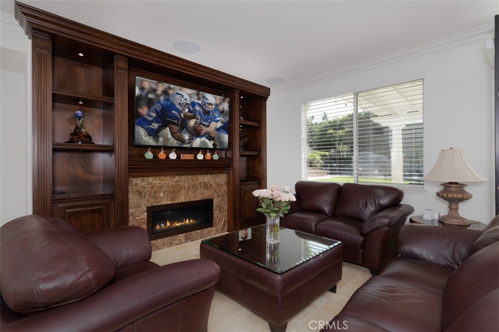 17722 Neff Ranch Road Yorba Linda, CA 92886 - Photo 15 of 63 a living room with furniture and a fireplace
