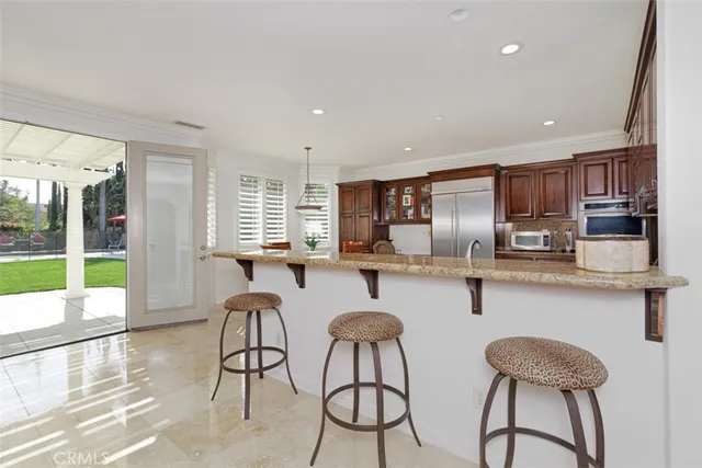 a bathroom with a double vanity sink mirror and toilet