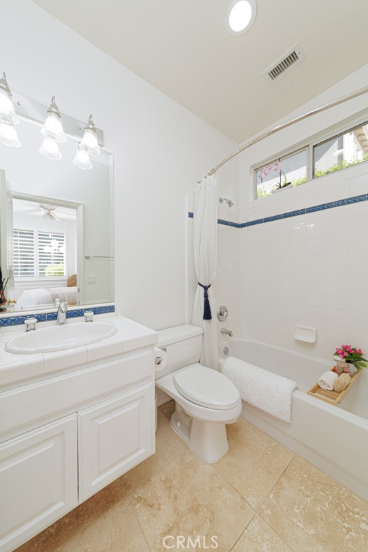 17722 Neff Ranch Road Yorba Linda, CA 92886 - Photo 21 of 63 a bathroom with a double vanity sink mirror and toilet