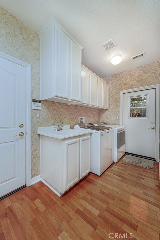 17722 Neff Ranch Road Yorba Linda, CA 92886 - Photo 22 of 63 a view of a kitchen with wooden floor