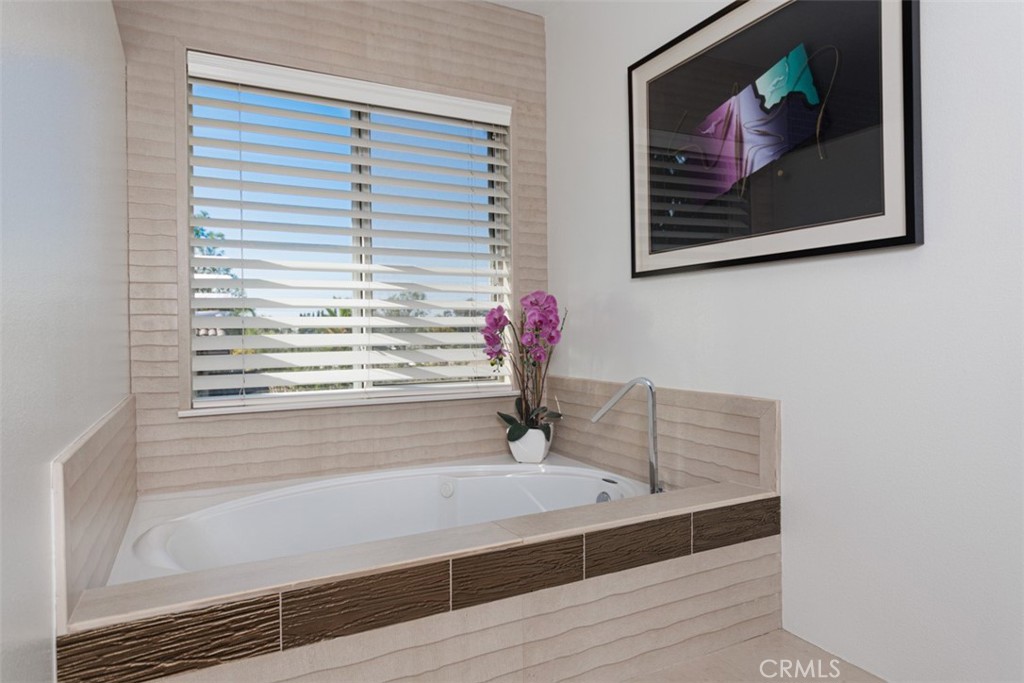 17722 Neff Ranch Road Yorba Linda, CA 92886 - Photo 30 of 63 a bathroom with a bathtub and a shower