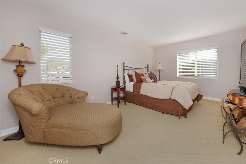 17722 Neff Ranch Road Yorba Linda, CA 92886 - Photo 33 of 63 a bedroom with bed and a couch