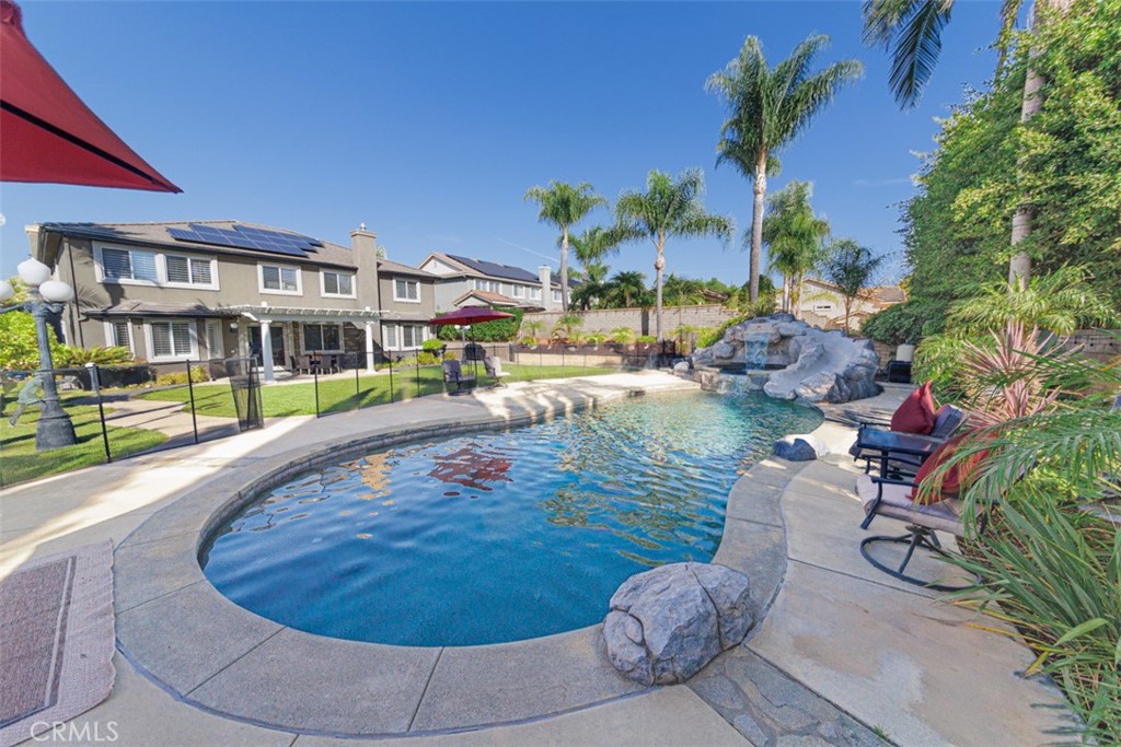 17722 Neff Ranch Road Yorba Linda, CA 92886 - Photo 37 of 63 a view of a swimming pool with outdoor seating