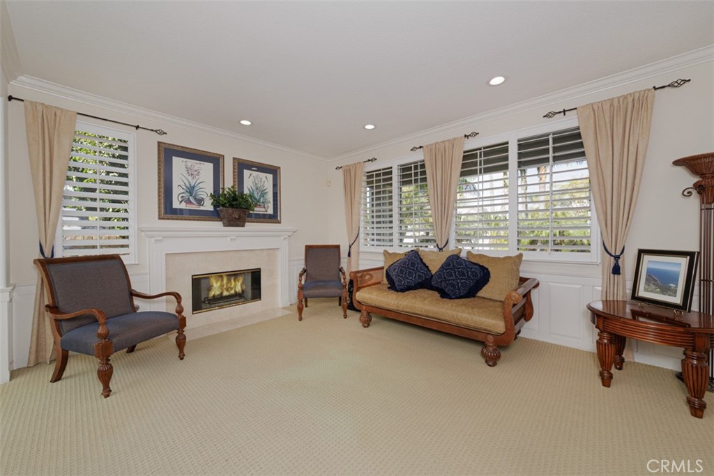 17722 Neff Ranch Road Yorba Linda, CA 92886 - Photo 5 of 63 a living room with furniture and a fireplace