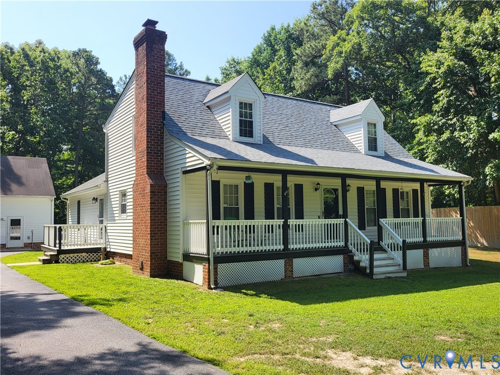 13521 Bailey Bridge Road Midlothian, VA 23112 - Photo 2 of 9 White siding residence featuring a covered front p