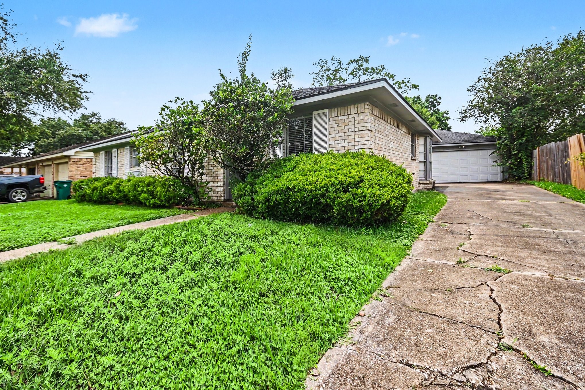 4306 Oneida Street Pasadena, TX 77504 - Photo 3 of 23 a front view of a house with garden